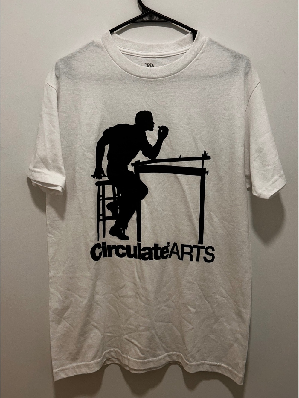 Circulate Arts White Graphic T-Shirt with Black Silhouette Design